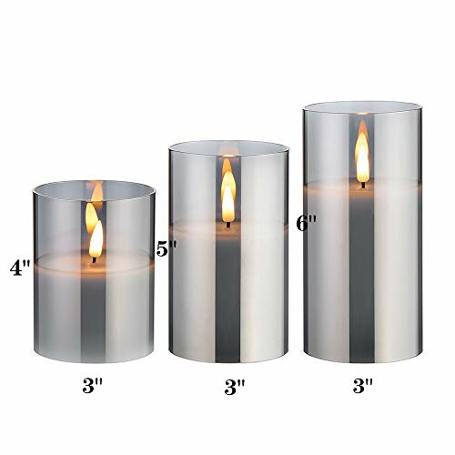 Set of three cylinder candles with varying heights and uniform width