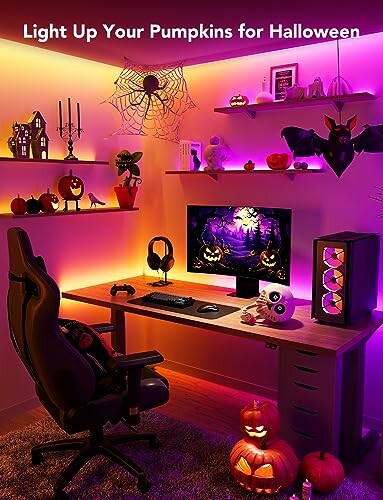 Halloween themed gaming setup with pumpkins, lights, and decorations.