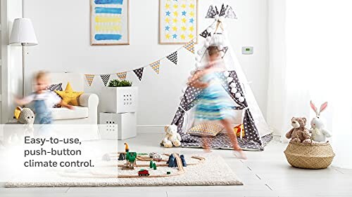 Children playing in a room with toys and a tent.