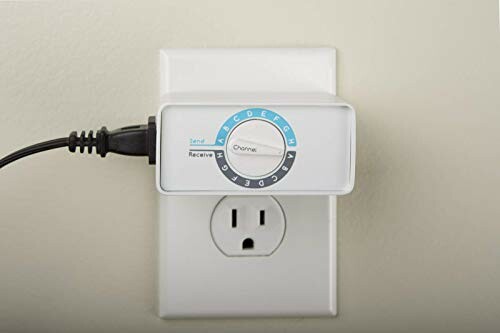 Plug-in wireless doorbell receiver in power outlet