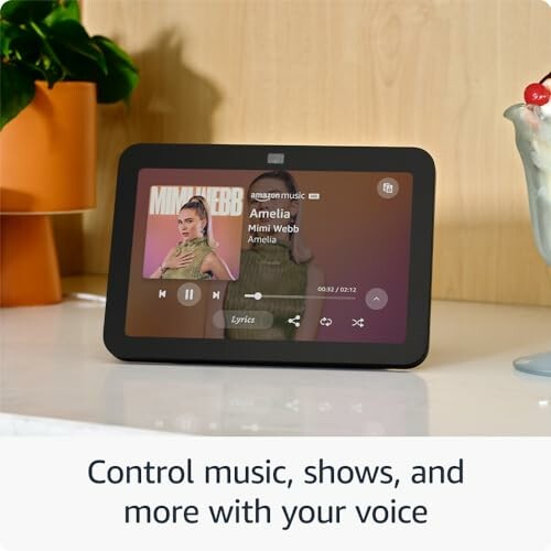 Smart display showing music control interface