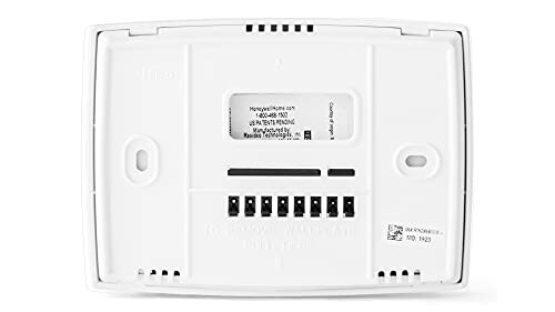 Back view of a thermostat showing wiring terminals and model details.